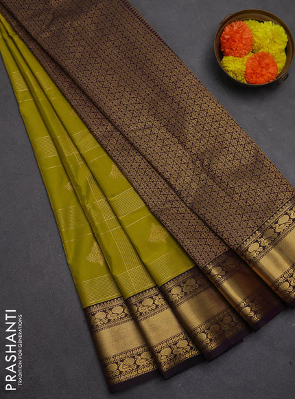Semi kanchipuram silk saree mustard green and deep purple with allover zari checks & buttas and rich rettapet zari woven korvai border