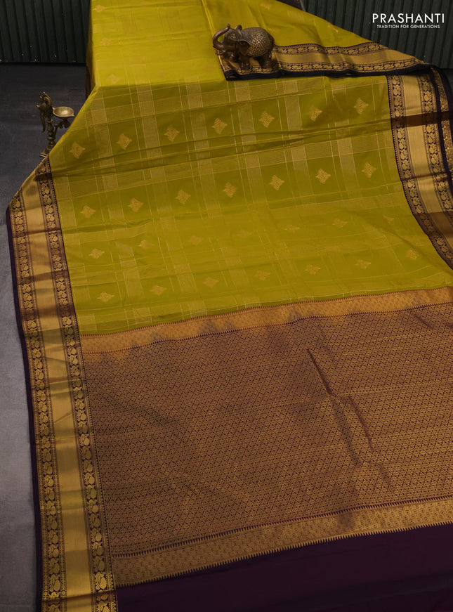 Semi kanchipuram silk saree mustard green and deep purple with allover zari checks & buttas and rich rettapet zari woven korvai border
