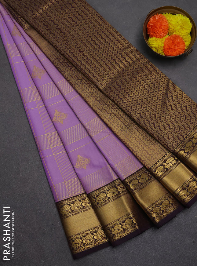Semi kanchipuram silk saree lavender and deep purple with allover zari checks & buttas and rich rettapet zari woven korvai border