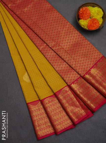 Semi kanchipuram silk saree mustard yellow and pink with allover zari checks & buttas and zari woven korvai border