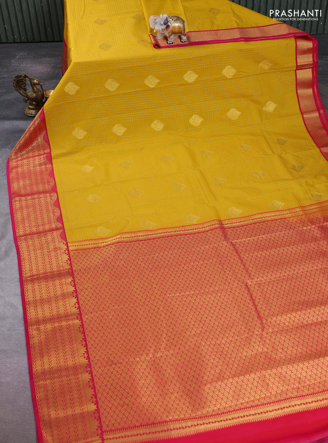 Semi kanchipuram silk saree mustard yellow and pink with allover zari checks & buttas and zari woven korvai border