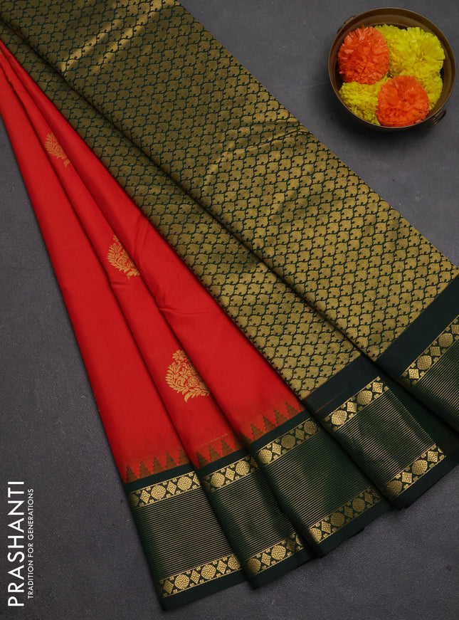 Semi kanchipuram silk saree orange and bottle green with zari woven buttas and temple design zari woven border