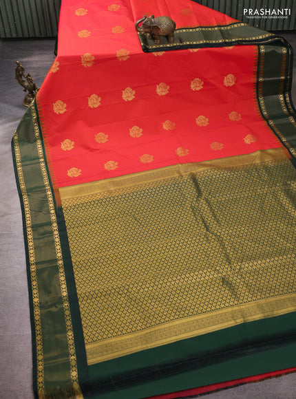 Semi kanchipuram silk saree orange and bottle green with zari woven buttas and temple design zari woven border