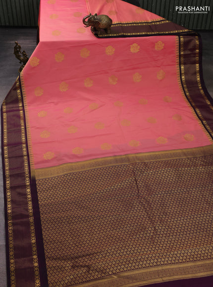 Semi kanchipuram silk saree peach pink and deep purple with zari woven buttas and temple design zari woven border