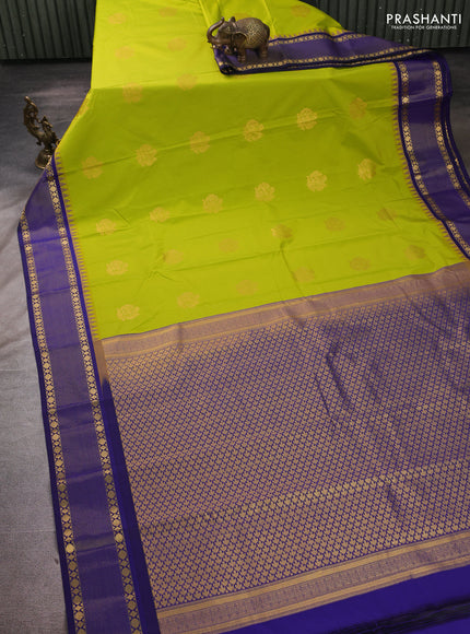 Semi kanchipuram silk saree fluorescent green and blue with zari woven buttas and temple design zari woven border