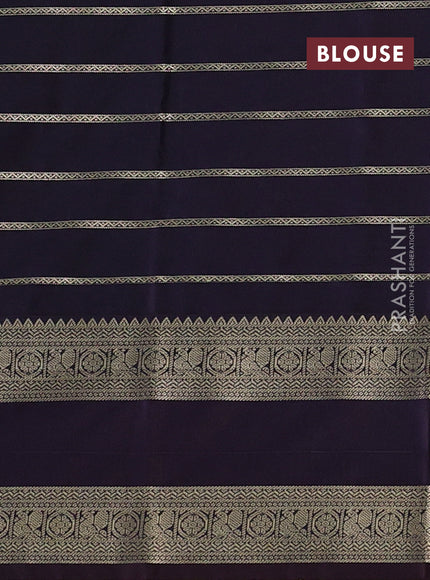 Semi kanchipuram silk saree teal green and deep jamun with allover zari weaves & buttas and temple design rettapet zari woven korvai border