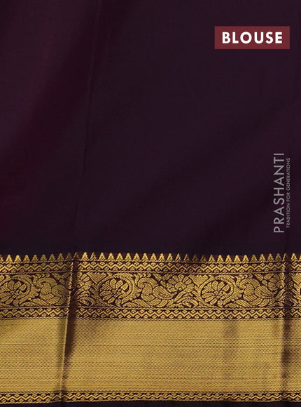 Semi kanchipuram silk saree dual shade of pinkish orange and deep purple with allover zari checks & buttas and temple design rich zari woven border