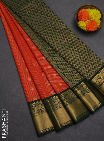 Semi kanchipuram silk saree orange and bottle green with allover zari checks & buttas and temple design rich zari woven border
