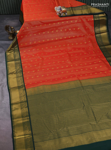 Semi kanchipuram silk saree orange and bottle green with allover zari checks & buttas and temple design rich zari woven border