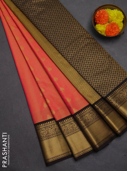 Semi kanchipuram silk saree dual shade of pinkish orange and coffee brown with allover zari checks & buttas and temple design rich zari woven border
