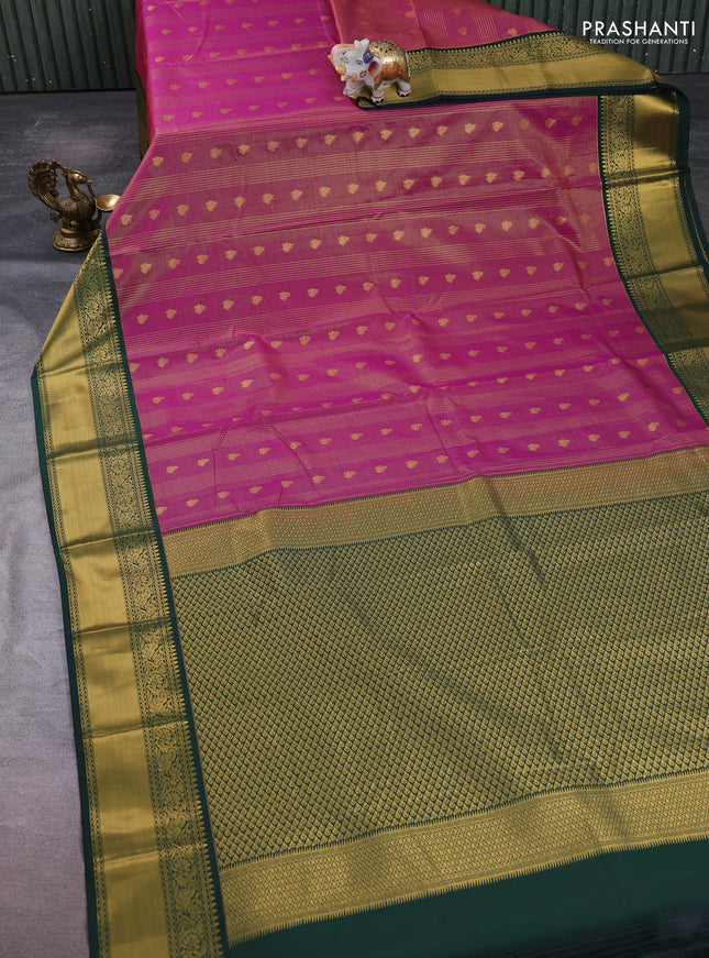 Semi kanchipuram silk saree magenta pink and bottle green with allover small zari checks & buttas and temple design rich zari woven korvai border
