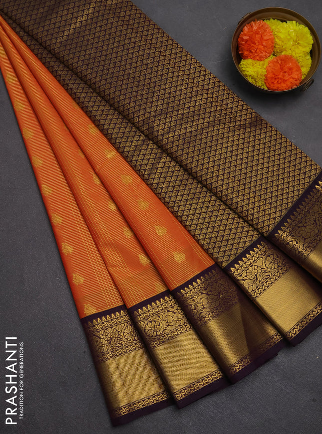 Semi kanchipuram silk saree orange and deep purple with allover small zari checks & buttas and temple design rich zari woven korvai border