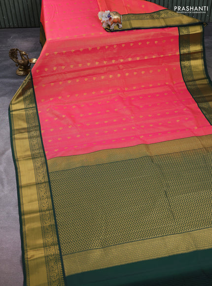 Semi kanchipuram silk saree tomato pink and bottle green with allover zari checks & buttas and rich temple design zari woven border