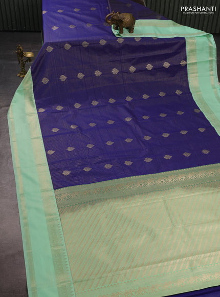 Semi kanchipuram silk saree navy blue and mild teal green with allover zari weaves & buttas and rettapet zari woven border