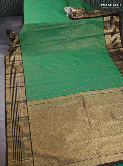 Semi kanchipuram silk saree green and coffee brown with allover small zari checks & buttas and temple desgin zari woven border