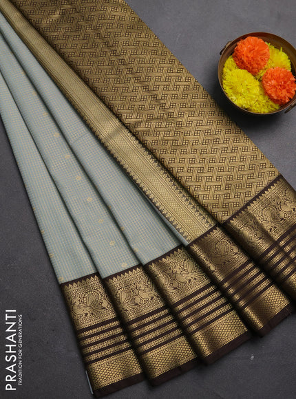 Semi kanchipuram silk saree grey shade and coffee brown with allover small zari checks & buttas and temple desgin zari woven border