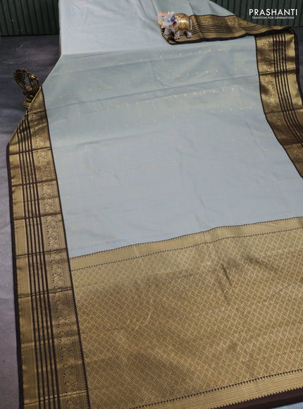 Semi kanchipuram silk saree grey shade and coffee brown with allover small zari checks & buttas and temple desgin zari woven border