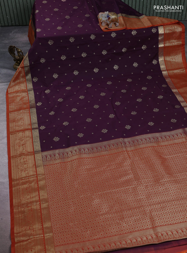 Semi kanchipuram silk saree deep wine and orange with allover zari woven buttas and long zari woven border