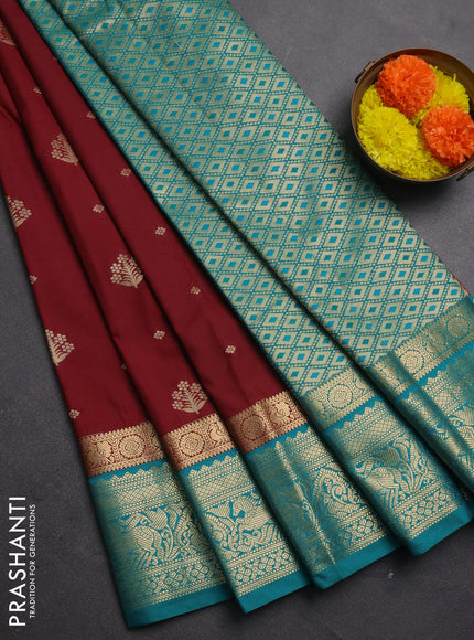 Semi kanchipuram silk saree maroon and teal green with allover zari woven buttas and long zari woven border