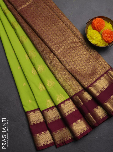 Semi kanchipuram silk saree light green and maroon shade with allover zari woven buttas and temple design rettapet zari woven border