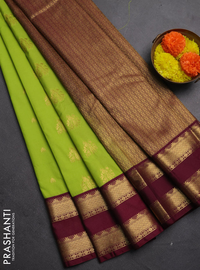 Semi kanchipuram silk saree light green and maroon shade with allover zari woven buttas and temple design rettapet zari woven border