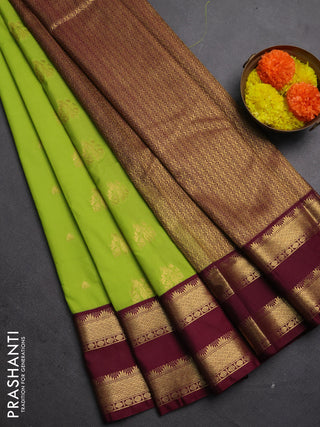 Semi kanchipuram silk saree light green and maroon shade with allover zari woven buttas and temple design rettapet zari woven border