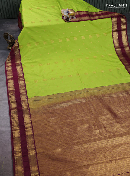 Semi kanchipuram silk saree light green and maroon shade with allover zari woven buttas and temple design rettapet zari woven border