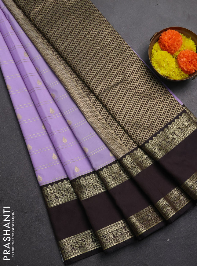Semi kanchipuram silk saree lavender and coffee brown with allover zari weaves & buttas and rettapet zari woven korvai border