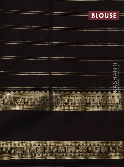Semi kanchipuram silk saree off white and black with allover zari weaves & buttas and rettapet zari woven korvai border