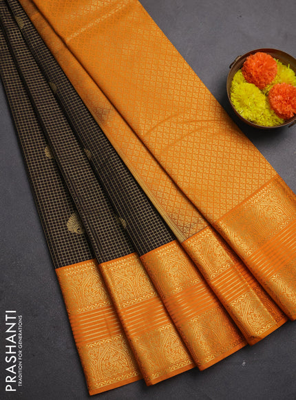 Semi kanchipuram silk saree black and mustard yellow with allover zari checks & buttas and long zari woven korvai border