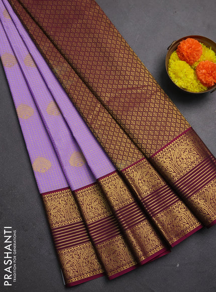 Semi kanchipuram silk saree lavender and dark magenta pink with allover zari checks & buttas and long zari woven korvai border