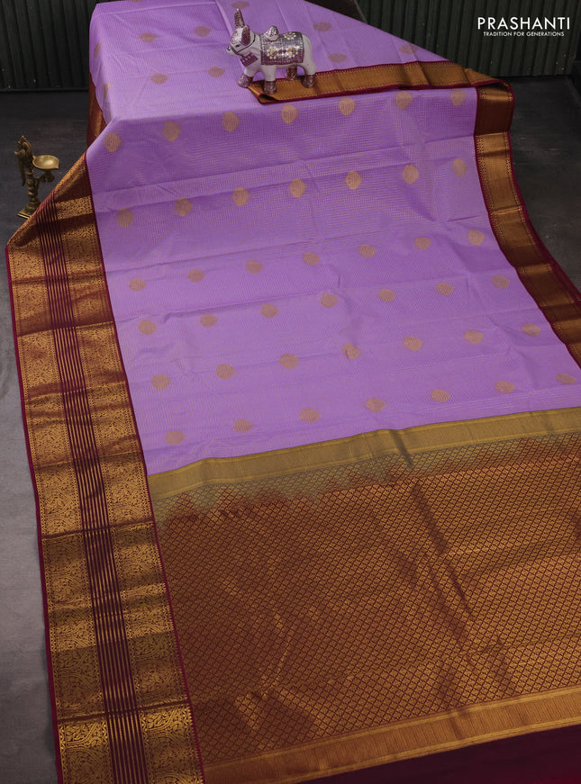 Semi kanchipuram silk saree lavender and dark magenta pink with allover zari checks & buttas and long zari woven korvai border