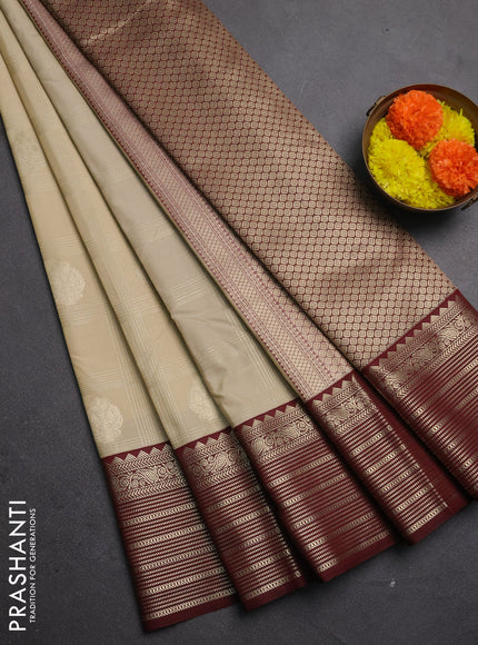 Semi kanchipuram silk saree beige and deep maroon with allover zari checks & buttas and zari woven border