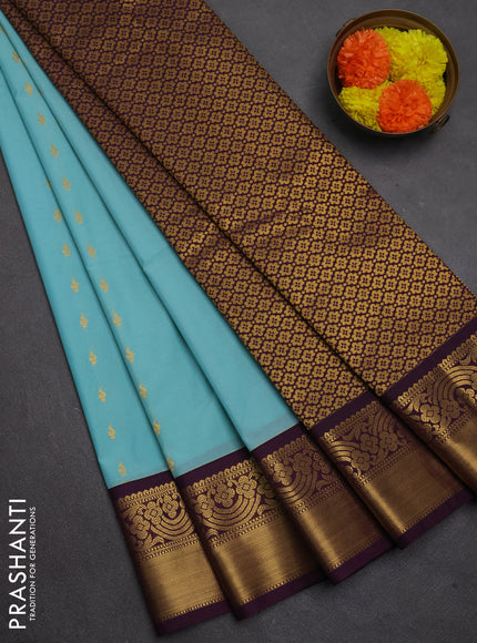 Semi kanchipuram silk saree teal blue and deep purple with allover zari woven buttas and rich zari woven border
