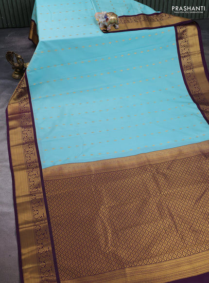 Semi kanchipuram silk saree teal blue and deep purple with allover zari woven buttas and rich zari woven border