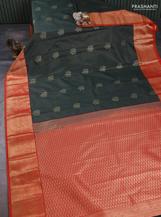 Semi kanchipuram silk saree bottle green and orange with allover zari checks & buttas and long zari woven border