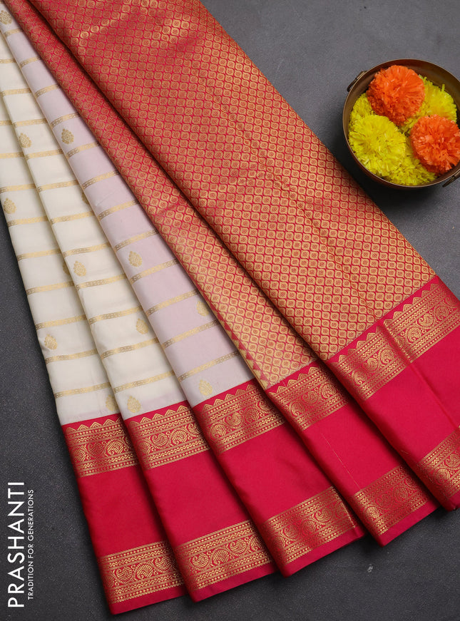 Semi kanchipuram silk saree off white and pink with allover zari weaves & buttas and rettapet zari woven korvai border
