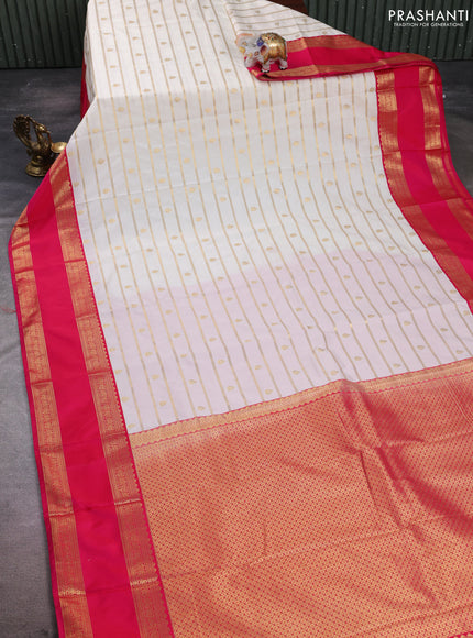 Semi kanchipuram silk saree off white and pink with allover zari weaves & buttas and rettapet zari woven korvai border