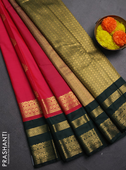 Semi kanchipuram silk saree pink and bottle green with allover zari woven buttas and long zari woven korvai border