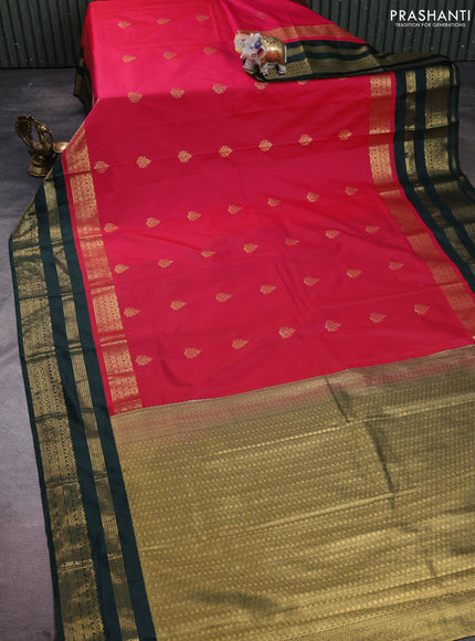 Semi kanchipuram silk saree pink and bottle green with allover zari woven buttas and long zari woven korvai border