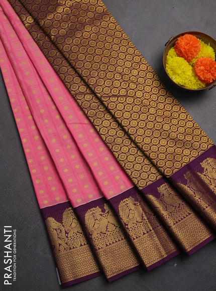 Semi kanchipuram silk saree pink shade and purple with allover checks & zari buttas and zari woven korvai border