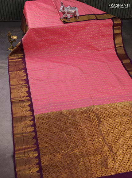 Semi kanchipuram silk saree pink shade and purple with allover checks & zari buttas and zari woven korvai border