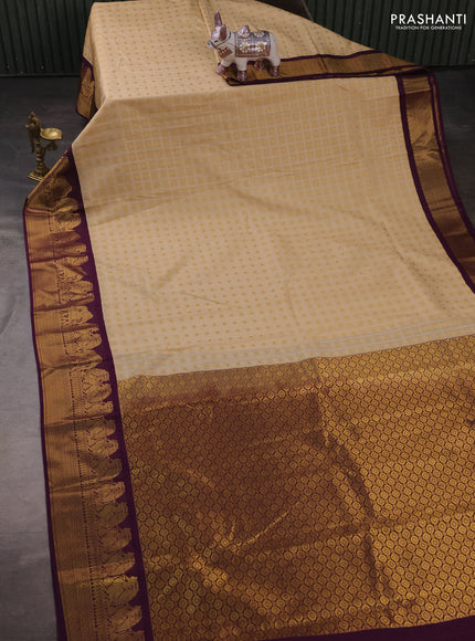 Semi kanchipuram silk saree beige and wine shade with allover checks & zari buttas and zari woven korvai border