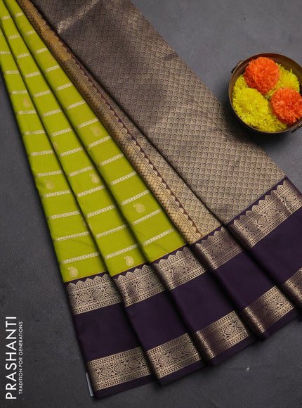 Semi kanchipuram silk saree lime green and deep purple with allover zari weaves & buttas and long rettapet zari woven border