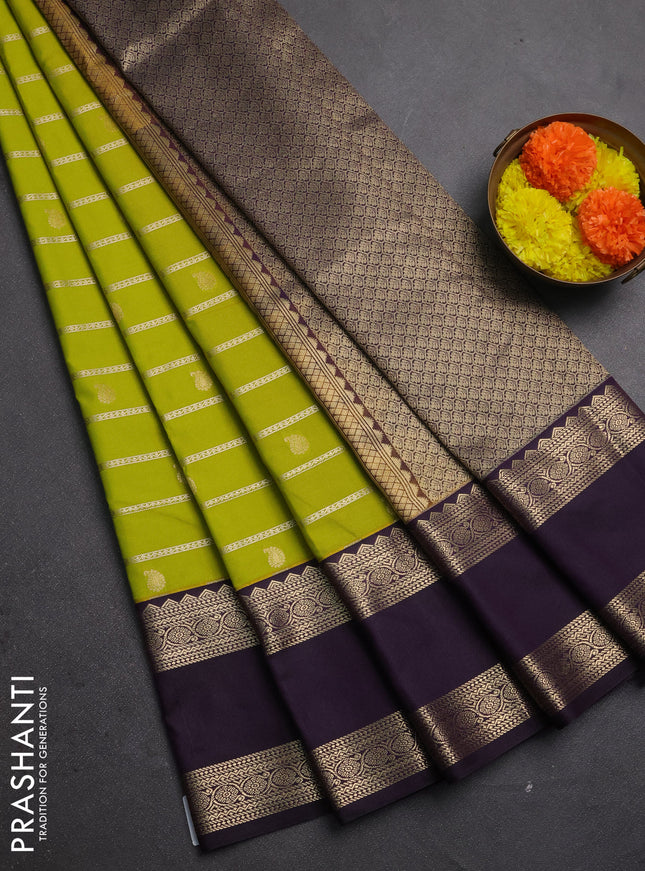 Semi kanchipuram silk saree lime green and deep purple with allover zari weaves & buttas and long rettapet zari woven border
