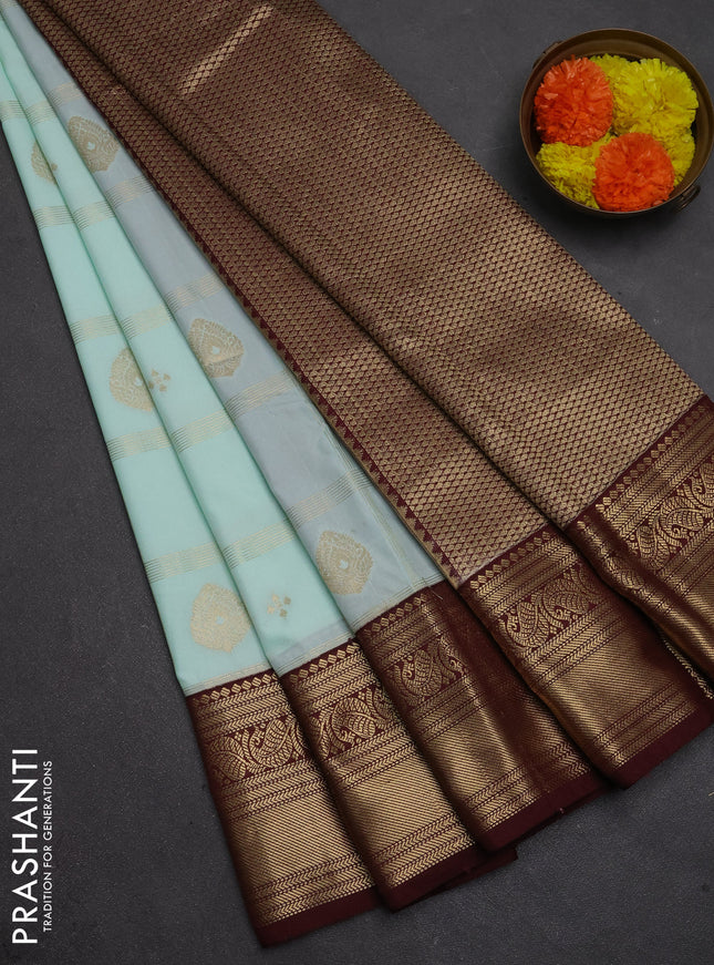 Semi kanchipuram silk saree mild teal green and maroon shade with allover zari checks & buttas and zari woven korvai border