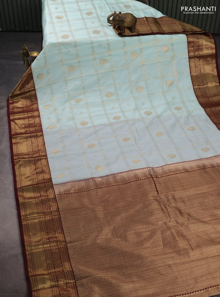 Semi kanchipuram silk saree mild teal green and maroon shade with allover zari checks & buttas and zari woven korvai border