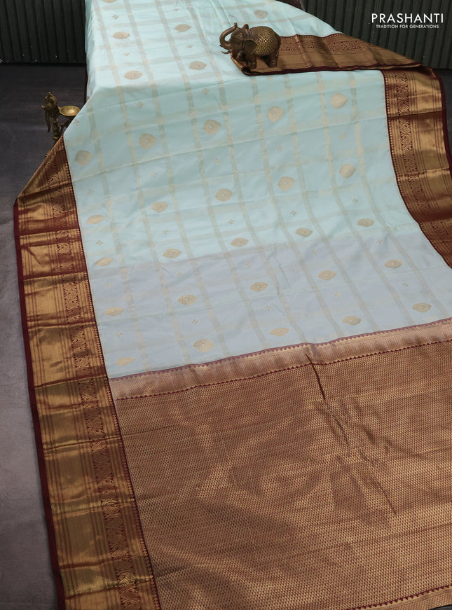 Semi kanchipuram silk saree mild teal green and maroon shade with allover zari checks & buttas and zari woven korvai border
