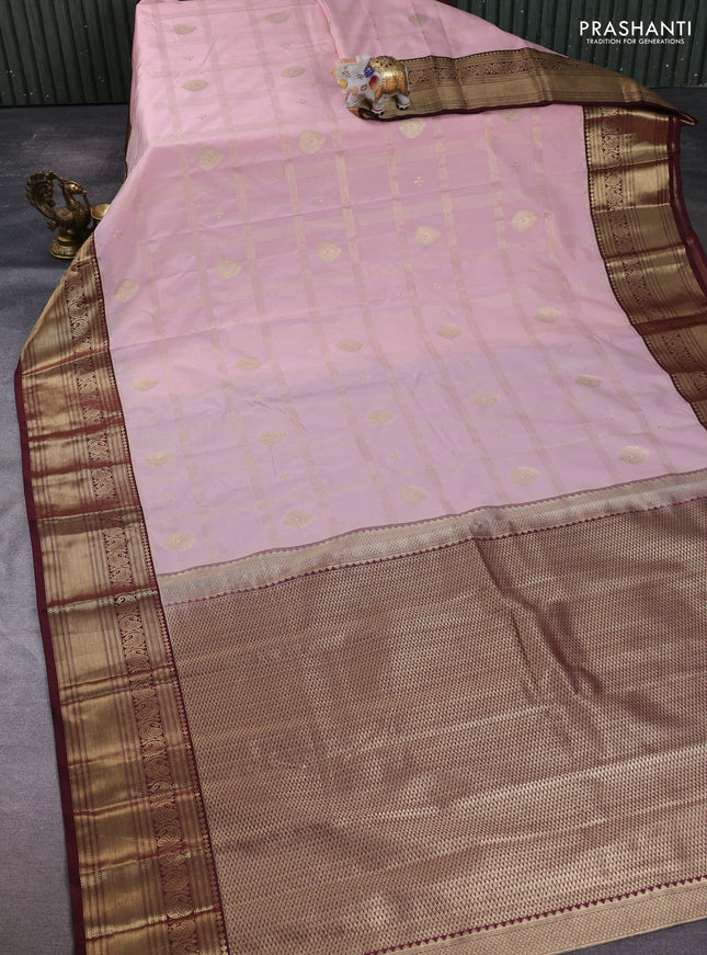 Semi kanchipuram silk saree pastel pink and deep maroon with allover zari checks & buttas and zari woven border