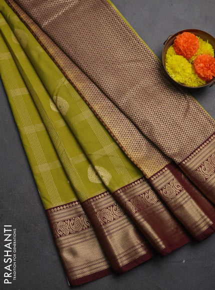 Semi kanchipuram silk saree mehendi green and maroon shade with allover zari checks & buttas and zari woven border